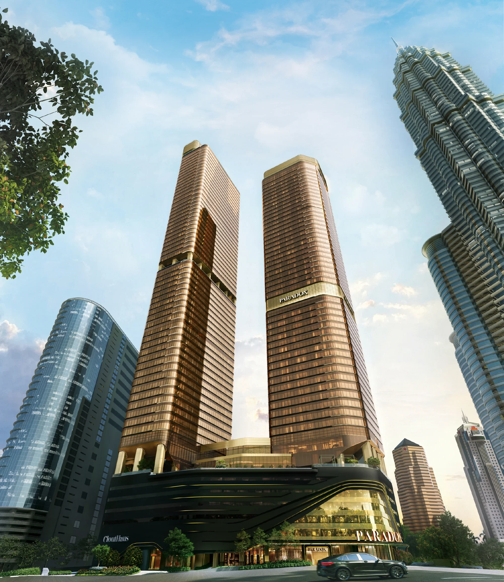 CloutHaus twin towers rising beside the Petronas Twin Towers in KLCC